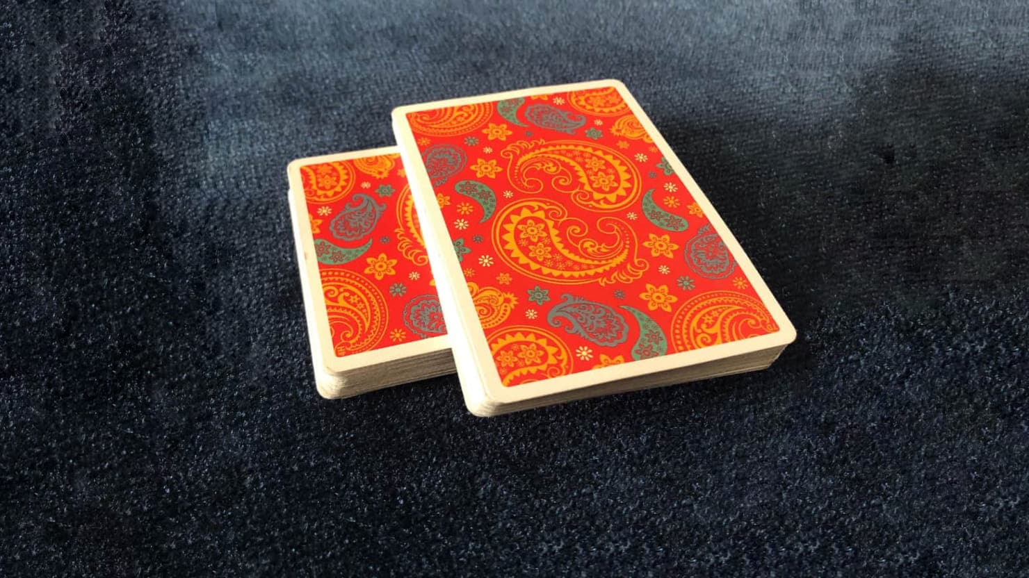 The Dapper Deck Playing Cards from Vanishing Inc. are used before an easy card trick with the cross cut force