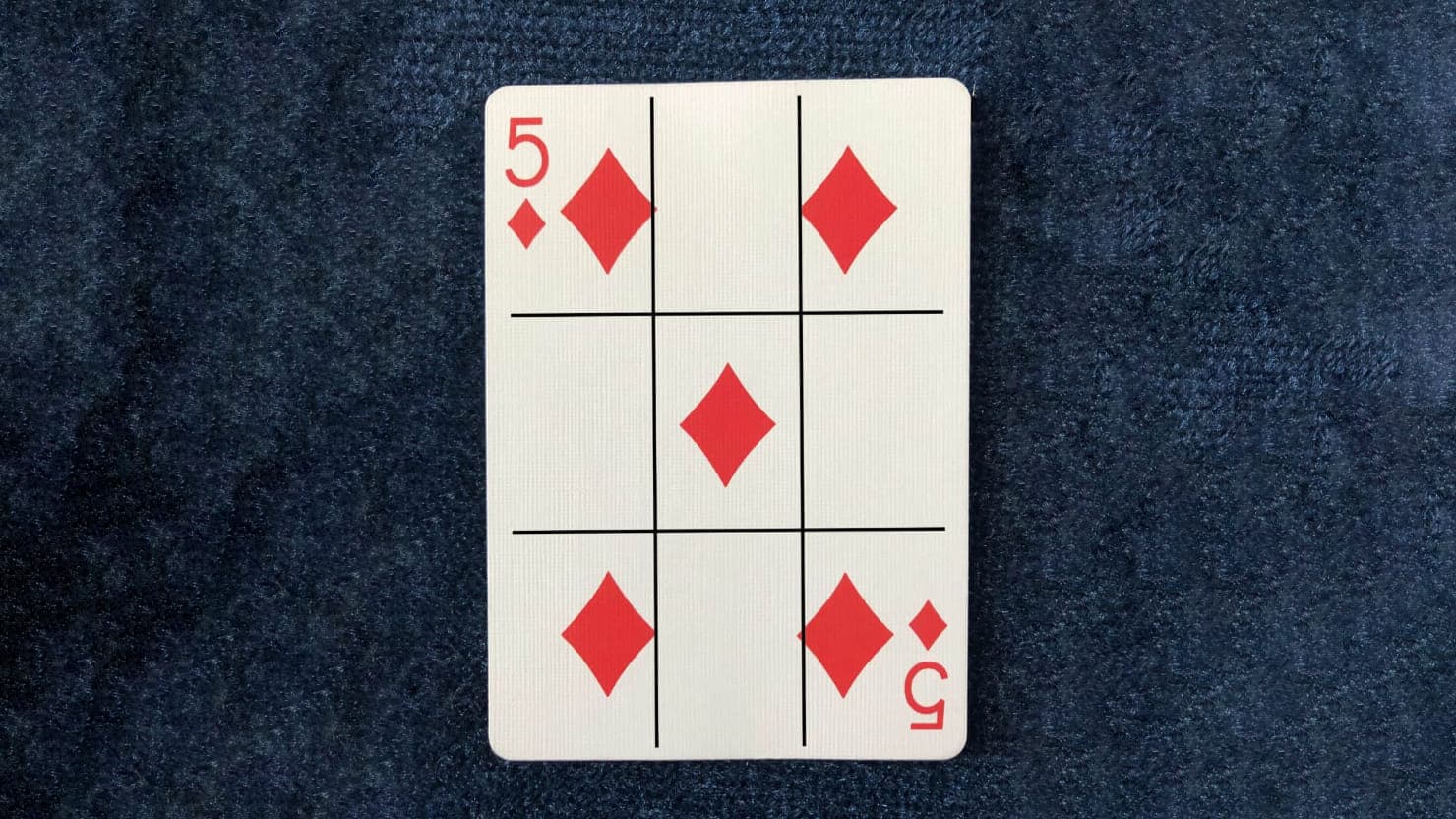 5 of Diamonds from The Dapper Deck Playing Cards from Vanishing Inc. is used for an easy mind reading card trick